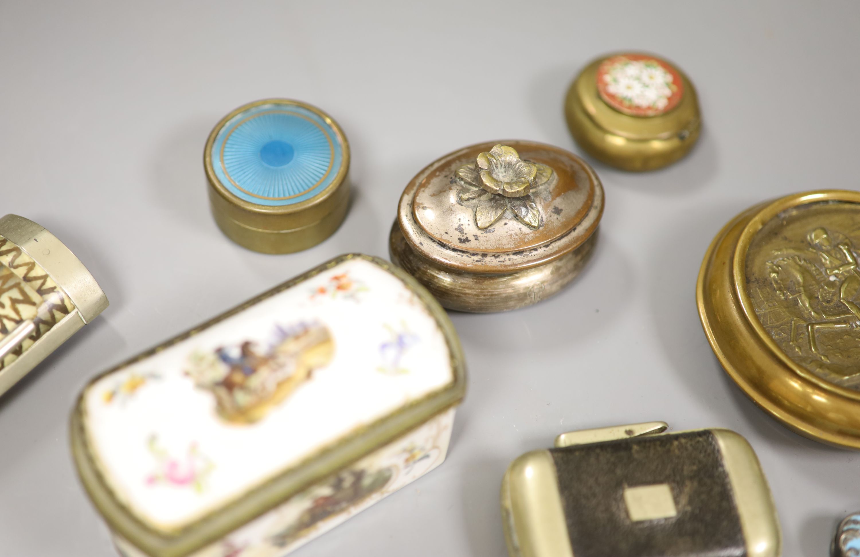 An ornate 19th century porcelain box together with two enamel boxes, snuff box etc. (8 items)